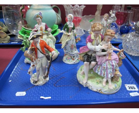 A "Meissen" Style Pottery Figure of a Soldier, (damaged) Sitzendorf pottery figures and Continental figures etc:- One Tray 