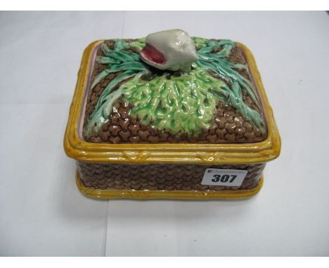 A XIX Century Majolica Pottery Lidded Box of Rectangular Form, having conch shell finial and green leaves to lid, brown matte