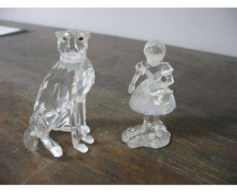 A Swarovski Lead Crystal Seated Leopard, height 10cms, and a Swarovski model of a young girl with basket. (2)