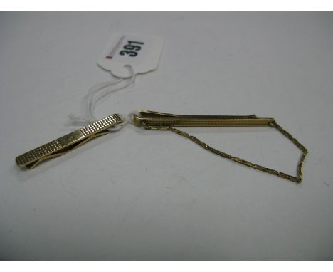 A 9ct Gold Gent's Tie Slide, suspending chain detail; together with another tie slide. (2)