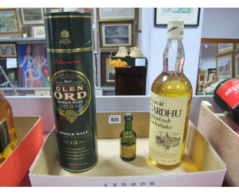 A Bottle of Cardhu Highland Malt Scotch Whisky 12 year Old,  a Courvoisier Cognac miniature together with a Glen Ord Single M