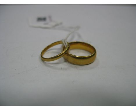 A 22ct Gold Plain Wedding Band, together with another smaller. (2)