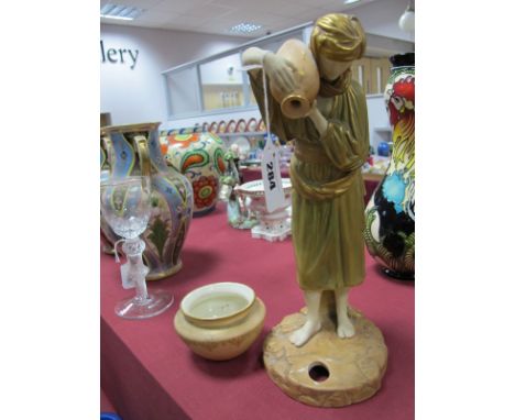 A Royal Worcester China Figure of an Eastern Water Carrier, after James Hadley, printed mark and pattern no. 594 to underside