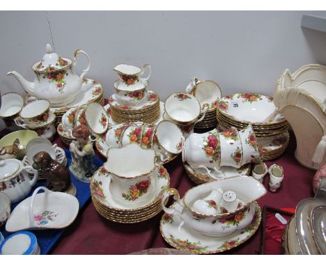 Royal Albert "Old Country Roses" Table Ware, comprising eight dinner, six dessert, twelve side and one bread plates, teapot, 