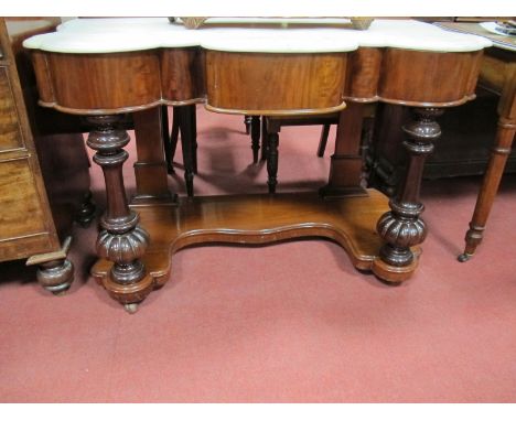 Mid XiX Century Mahogany Washstand, with a low back, shaped white marble top, the base with central drawer on turned gadroone