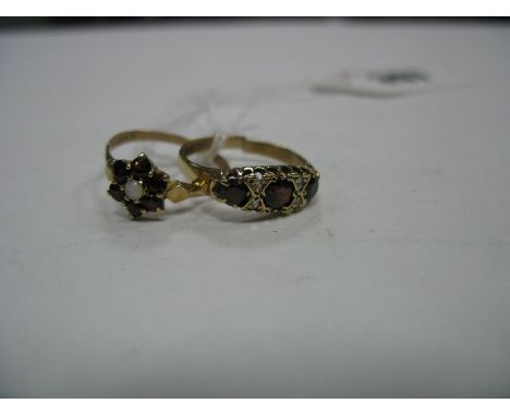 A 9ct Gold Garnet Set Cluster Ring, of flowerhead design; together with another 9ct gold ring. (2)