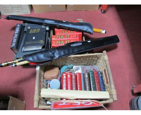 A Super League Two Section Pool Cue, a snooker cue (both cased), automobile reference guides, napkins, playing cards, scented