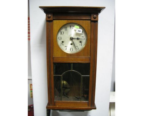 Early XX Century Oak Cased Wall Clock, with a silvered dial, together with oak aneriod barometer (Wilks Brothers Sheffield).