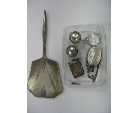 A Hallmarked Silver Backed Hand Mirror, engine turned, an Art Nouveau souvenir note book, a mother of pearl scent flask, a ma