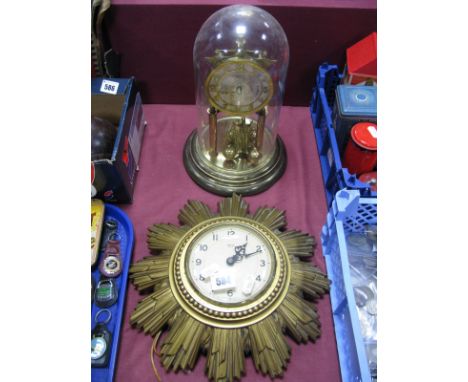 Smith Sectric Sunburst Wall Clock, together with a German domed clock (dial rubbed). (2)