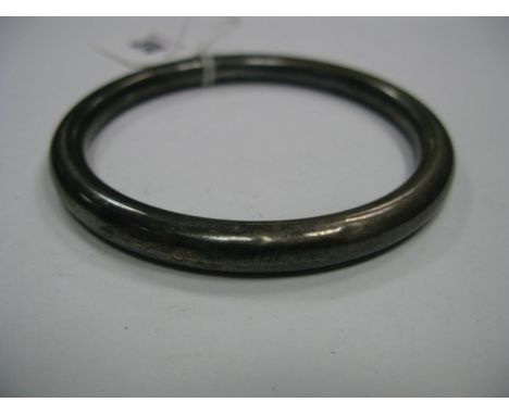 A Chester Hallmarked Silver Bangle, of plain design. 