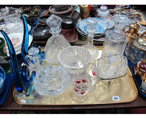 A Cut Glass Decanter, diamond shaped body and stopper, two other decanters, a lidded glass bowl, two small glass vases decora