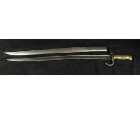 A French chassepot bayonet, dated 187157cm yataghan single edged single fullered blade, marked St Etienne Jullet 1871, with s