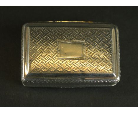 A George IV silver snuff box
Of rectangular form, with lattice engraved decoration, vacant rectangular cartouche to the lid, 