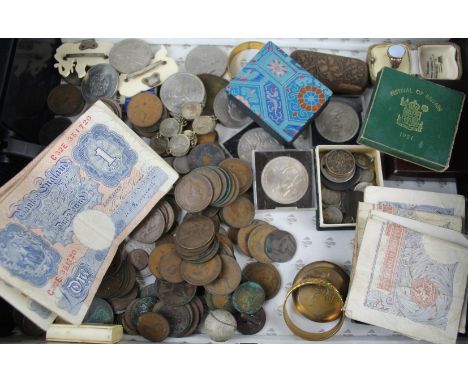 A collection of assorted British coinageTo include crowns, pennies, paper bank notes to include one pound, ten shillings etc.