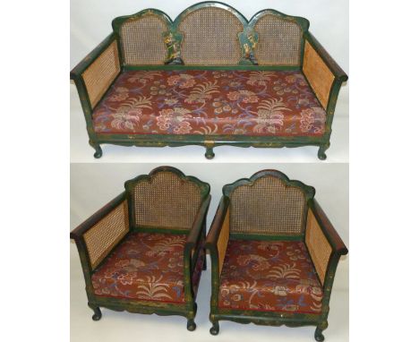 A 20th Century three piece single cane bergere suiteComprising two seater sofa and two armchairs, with green ground chinoiser