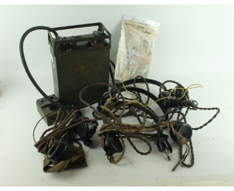 ^A wireless set number 38MK2, mid 20th CenturyThe green painted metal case, serial no 146002, complete with four sets of head