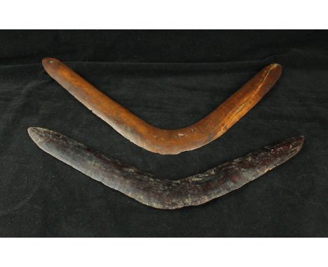 Two Australian Aboriginal boomerangs, early 20th CenturyThe first 44cm wide boomerang with paper label with ink inscription '