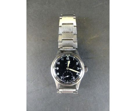 A gentleman's Omega military issue wristwatchThe circular dial with Arabic numerals and military arrow with subsidiary second