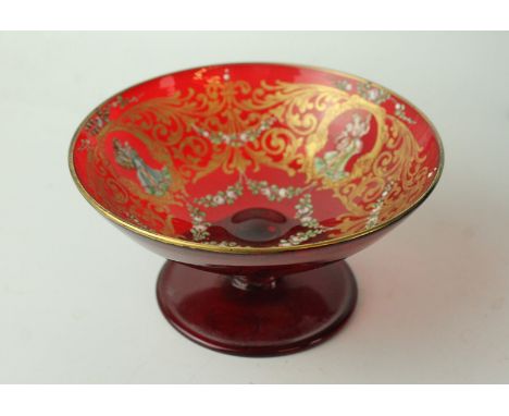 A small Venetian glass pedestal bowl
Decorated with enamel detail and gilt swags, 11cm diameter 