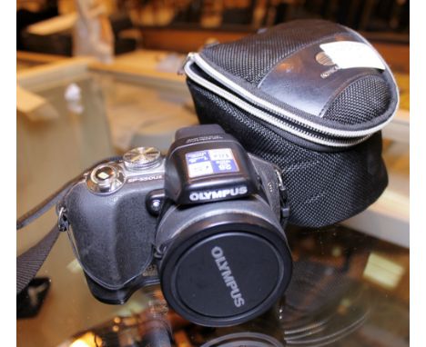 Olympus digital camera SP-5500Z and bag