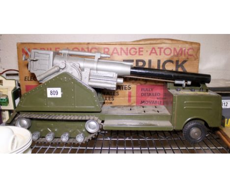 Louis Marx atomic cannon truck electrically operated in box lacking missiles