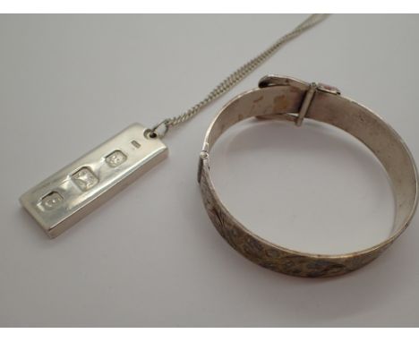 Silver belt bangle 34g and a silver ingot 
