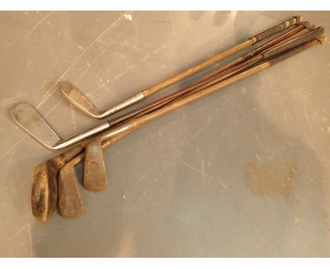 Vintage golf clubs including three hickory handled examples
