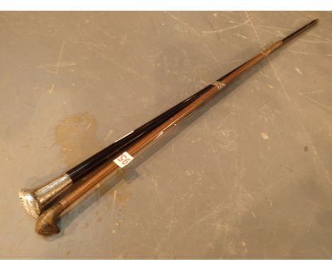 Wooden duck headed swagger stick or childs cane and a silver topped gentlemans cane London 1901 