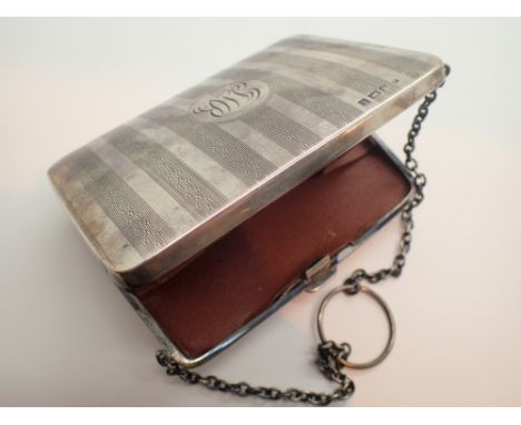 Hallmarked silver engine turned ladies evening purse with leather interior 112g