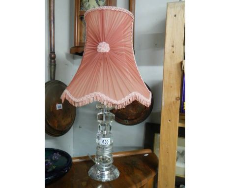 A late 20th century acrylic table lamp with early shade.