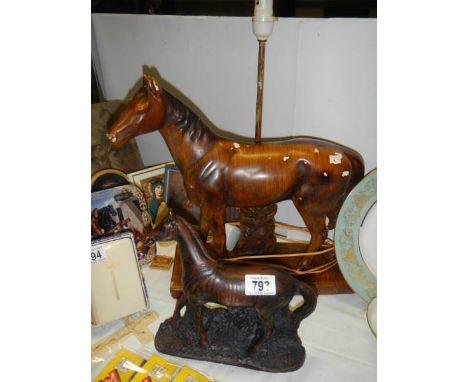 A horse table lamp and a horse figure.