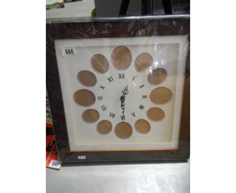 A good quality clock / picture framed for 12 pictures