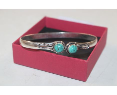A 925 silver and turquoise set bangle 