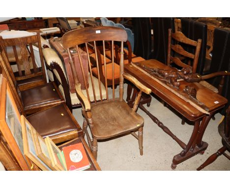 An elm seated stick back armchair 