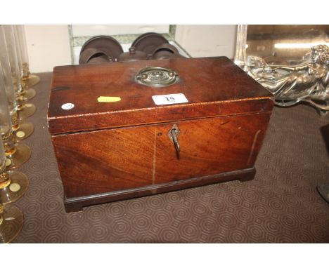 A George III mahogany and chequer edged tea caddy with original pewter canisters 