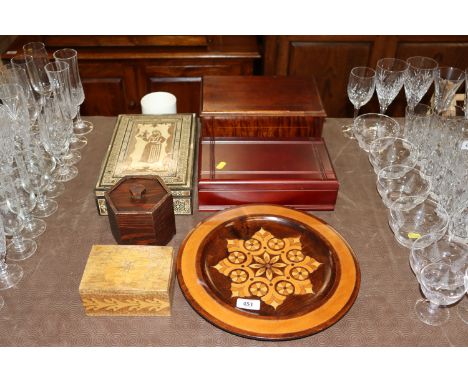 A decorative wooden plate; a jewellery box and various trinket boxes 