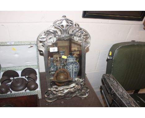 A large Art Nouveau style white metal easel mirror in WMF manner with female and foliage 