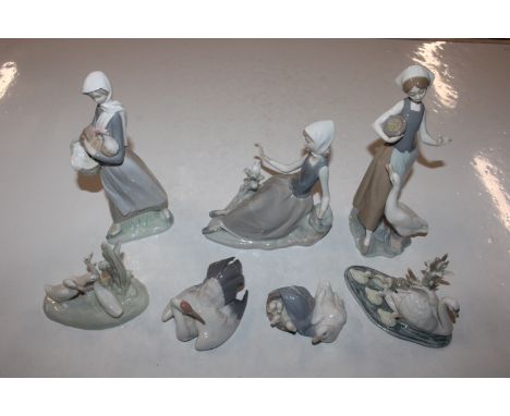 Seven Lladro and Nao ornaments - some AF