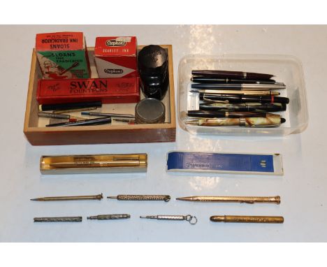 A box of assorted vintage fountain pens, others pens, pencil s and accessories to include Waterman's gold plated pen