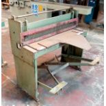 Treadle operated guillotine