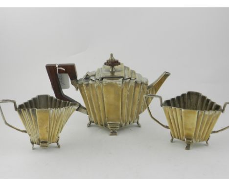 An Art Deco style silver plated three piece tea service.