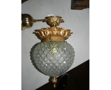 A glass hanging ceiling light, having gilt metal mounts and finial 
