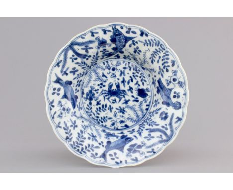 A blue and white Chinese export porcelain plate with crabs and fish, Kangxi, ca. 1700 Dia.: 20,5 cm Condition reports and hig