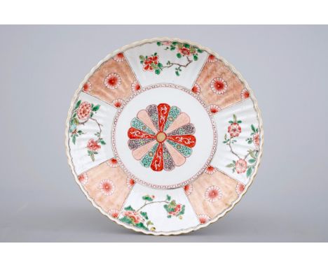 A Chinese famille verte and imari plate, Kangxi, ca. 1700 Dia.: 27 cm      Provenance: The Van Herck collection, Antwerp Cond