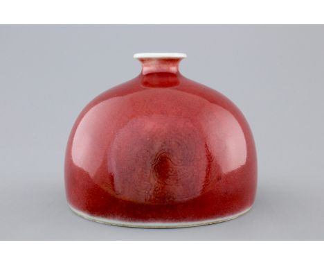 A Chinese peachbloom-glazed beehive waterpot, Kangxi mark, 18/19th C. H.: 9,5 cm Condition reports and high resolution pictur