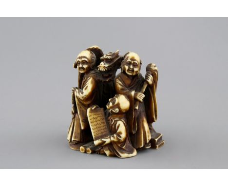 A Japanese patinated ivory netsuke: a dragon amongst sages, 19th C. H.: 4,8 cm Condition reports and high resolution pictures