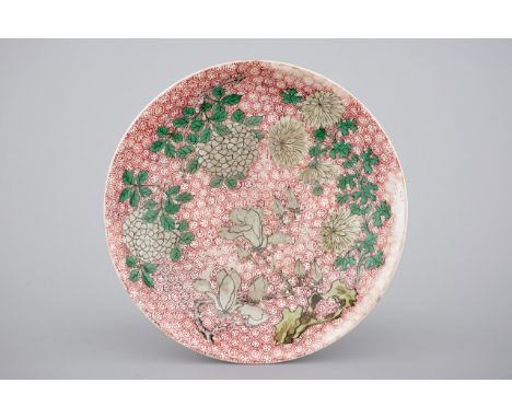 A Chinese wucai dish with flowers, Transitional to early Kangxi, 17th C. Dia.: 27,5 cm  Provenance: The Van Herck collection,