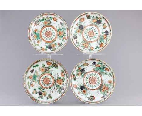 A set of four Chinese famille verte porcelain plates with flowers, Kangxi, ca. 1700 Dia.: 22,5 cm Condition reports and high 