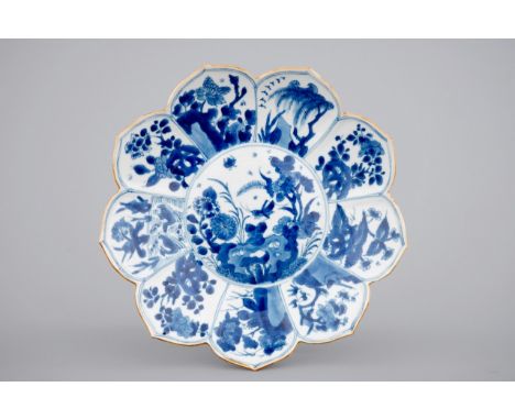 A blue and white Chinese porcelain lotus shaped plate, Kangxi, ca. 1700 Dia.: 23 cm  Condition: A small firing crack with a s